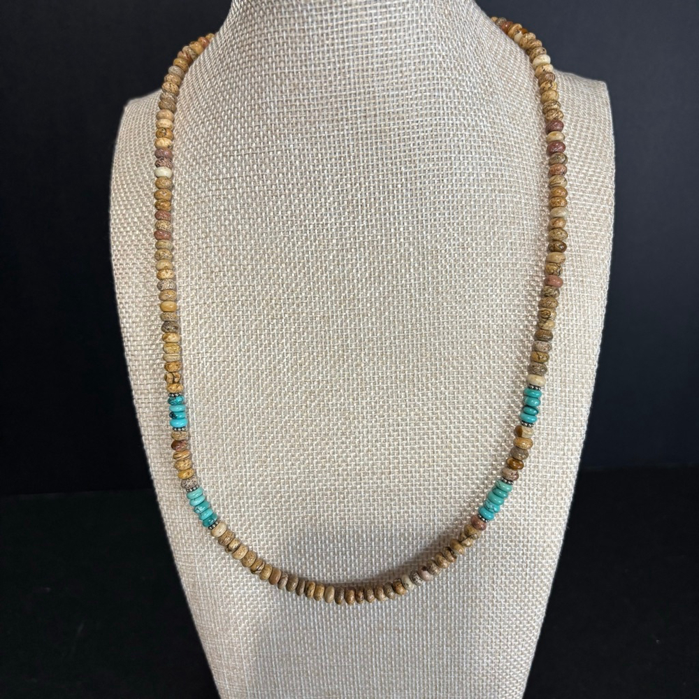 beaded necklace featuring turquoise and coconut shell beads
